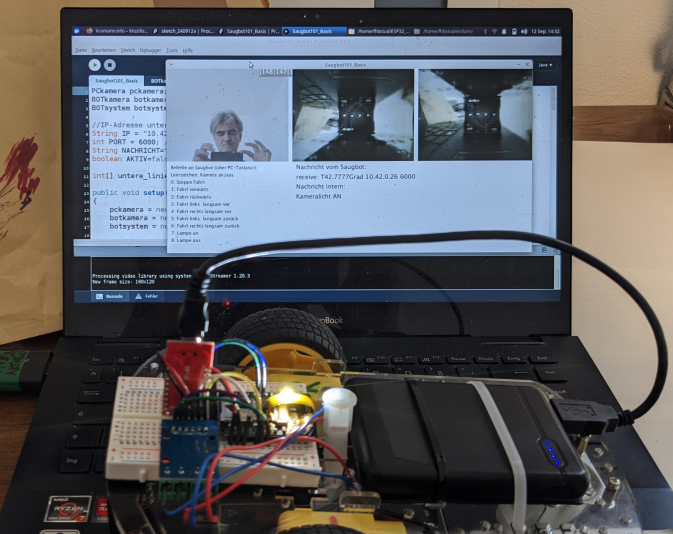 Funktionstest des autonomen Fahrzeugs mit Hilfe des Java/Processing-Sketches Saugbot101_Basis. Gerade wurde die LED-Leuchte ferngesteuert eingeschaltet.